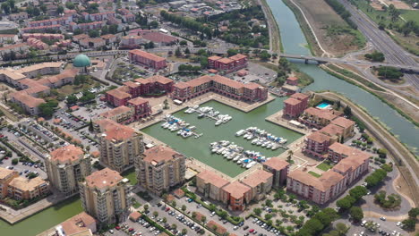Beautiful-aerial-view-of-Port-Ariane-marina-leisure-boats-and-residential-area